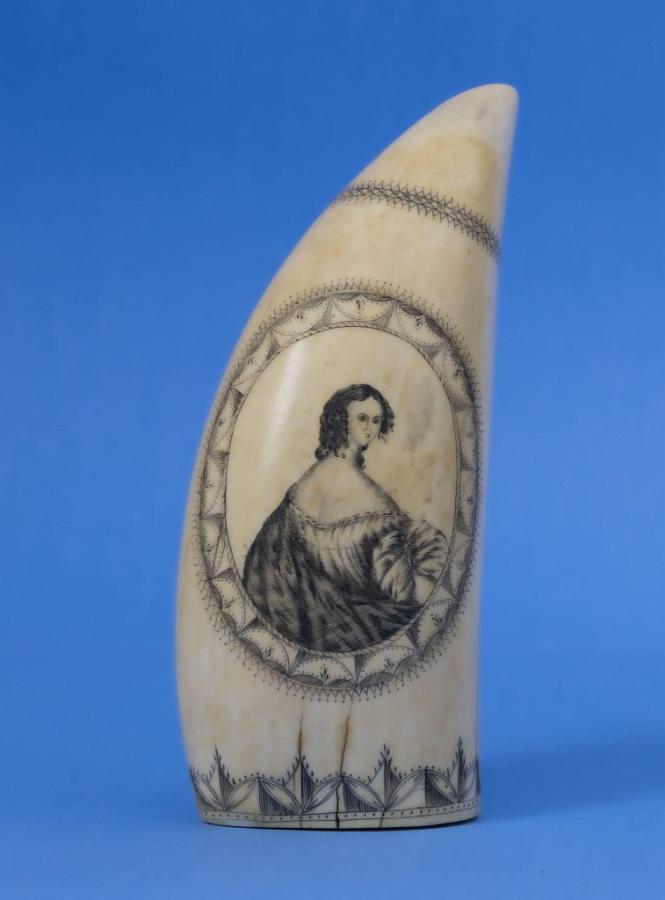 Scrimshaw Whales Tooth Engraved on Both Sides Depicting Women Inside Fancy borders attributed to the Bank Note Engraver, American circa 1840