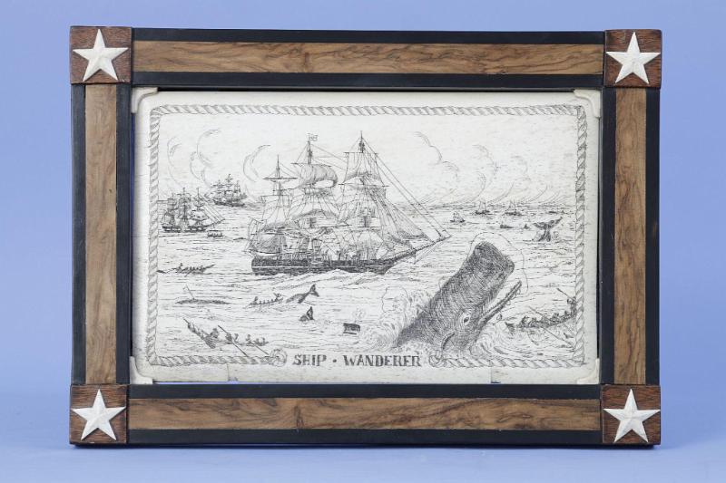 Rare Pan Bone Plaque depicting a whaling scene and signed with "WP" initials hidden in the work, American circa 1945.