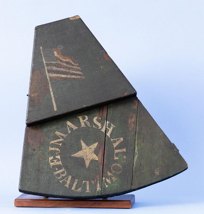 Ebony Framed Octant with Engraved Radius arm with two peep sites, The Instrument retains its original green painted wood step down painted Box with the label of Aaron Breed of Boston. "EJ Marsh Balitimo." is hand painted in a circle with a painted five pointed star at its center. There is a hand painted American Flag at the top section of the box.