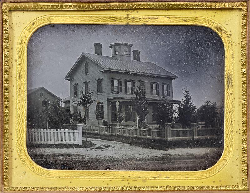 Cased Half Plate Daguerreotype Featuring a Fine House with Cupola and a White Picket Fence, American circa 1850