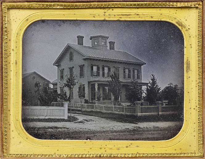 Cased Half Plate Daguerreotype Featuring a Fine House with Cupola and a White Picket Fence, American circa 1850